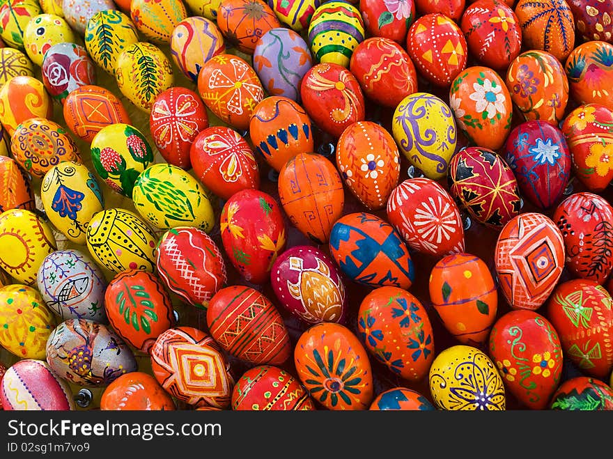 Yellow, red, orange painted Easter Eggs