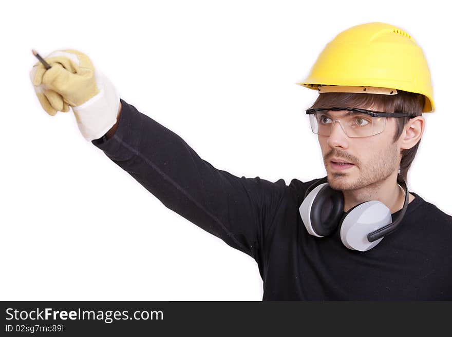 Construction worker drawing plan with pencil over white