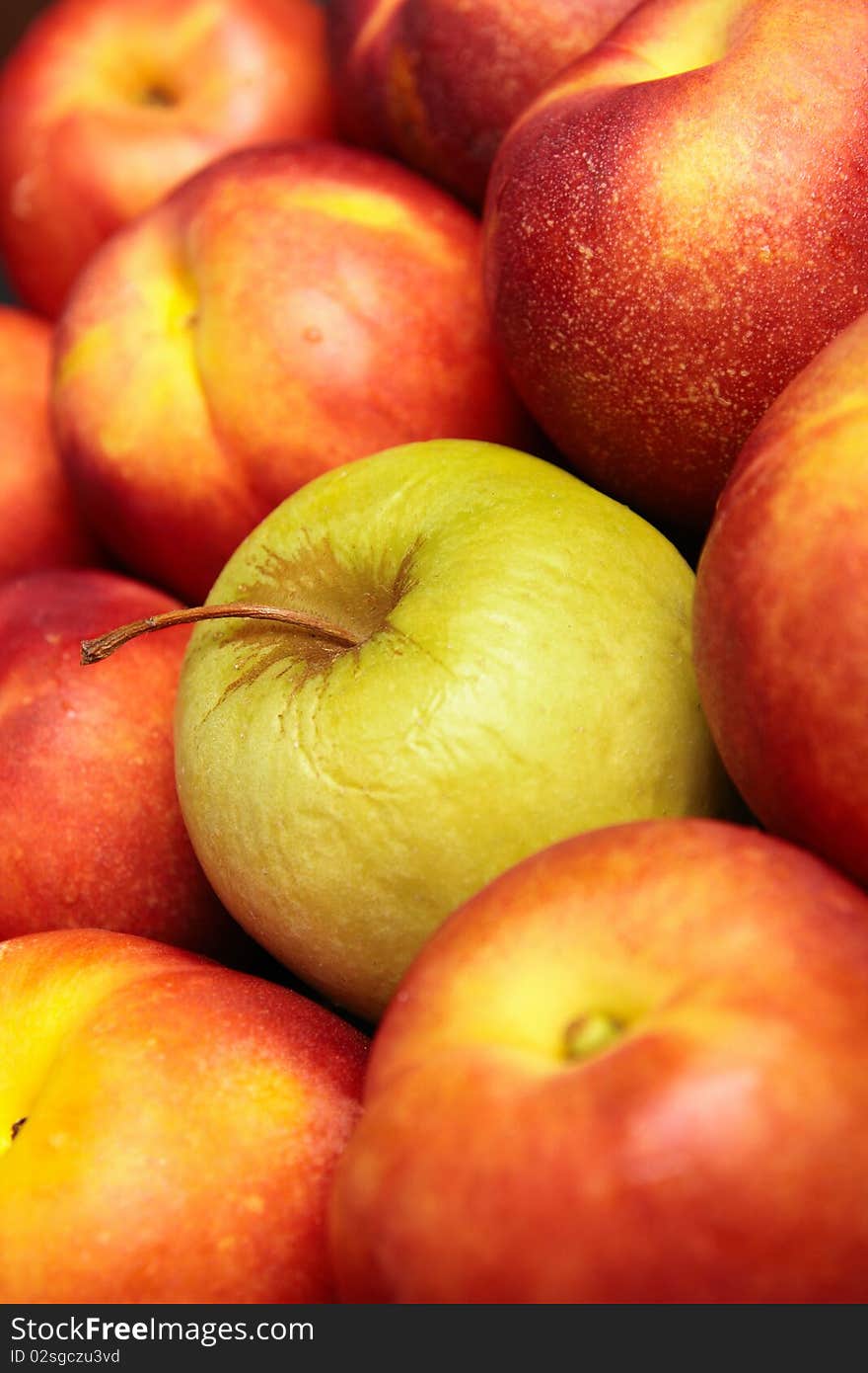 Ripe nectarines and yellow apple. Ripe nectarines and yellow apple