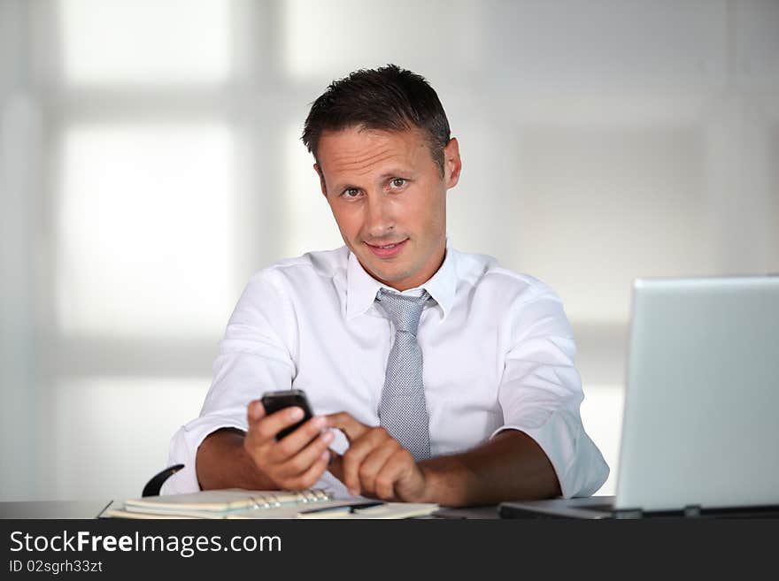 Businessman working in the office. Businessman working in the office