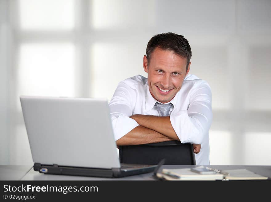 Businessman working in the office. Businessman working in the office