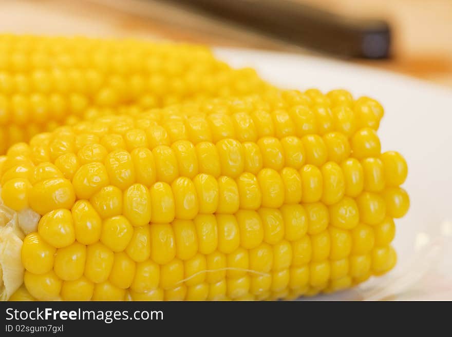 Close up of a sweetcorn and butter (corn on the cob). Close up of a sweetcorn and butter (corn on the cob)