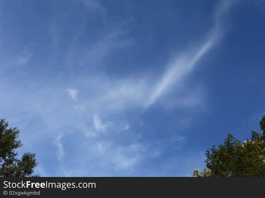 The warm windy places the dark blue sky with floating clouds open space and force of air elements. The warm windy places the dark blue sky with floating clouds open space and force of air elements