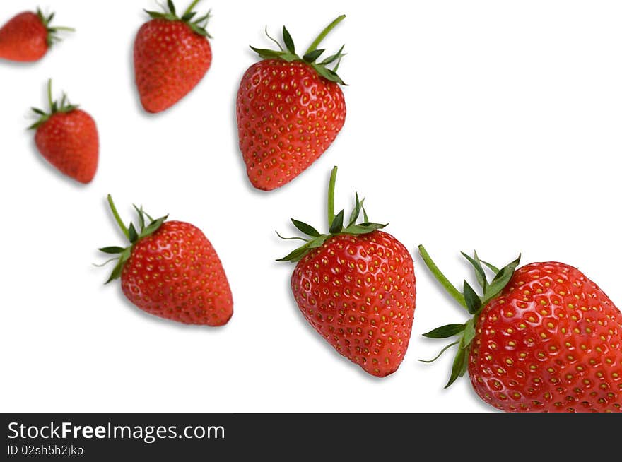 Fresh strawberries on a white background. Fresh strawberries on a white background