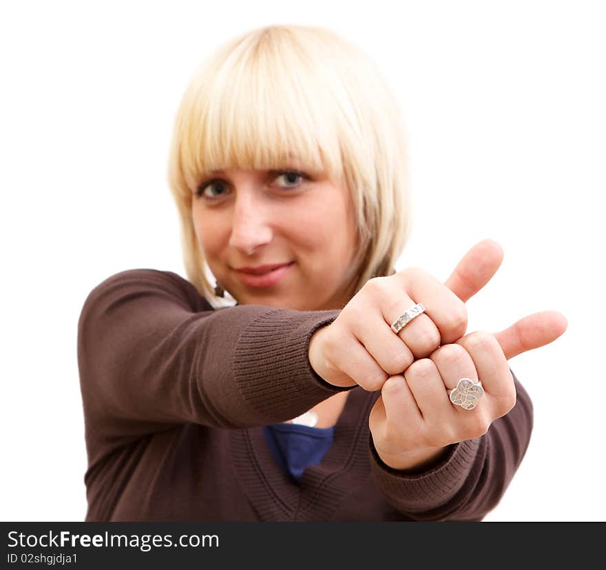 A young woman showing us the sign of success