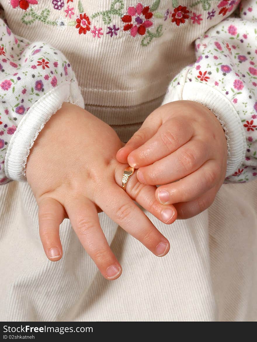 Childs hand with ring closeup. Childs hand with ring closeup