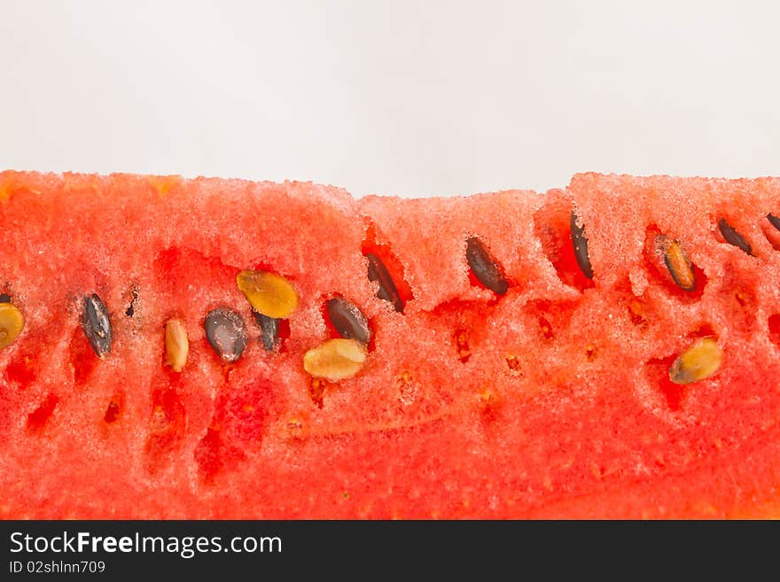 Closeup slice of watermelon, isolated on white. Closeup slice of watermelon, isolated on white