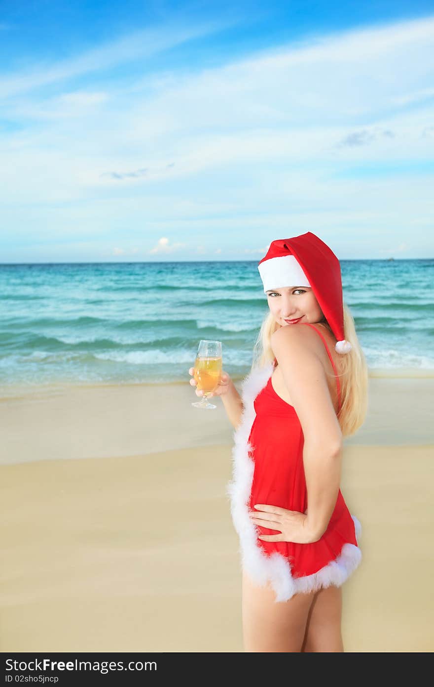 Santa's helper with glass of champagne