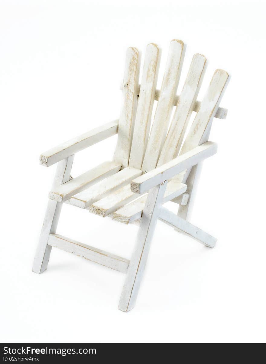 Toy deck chair on a white background