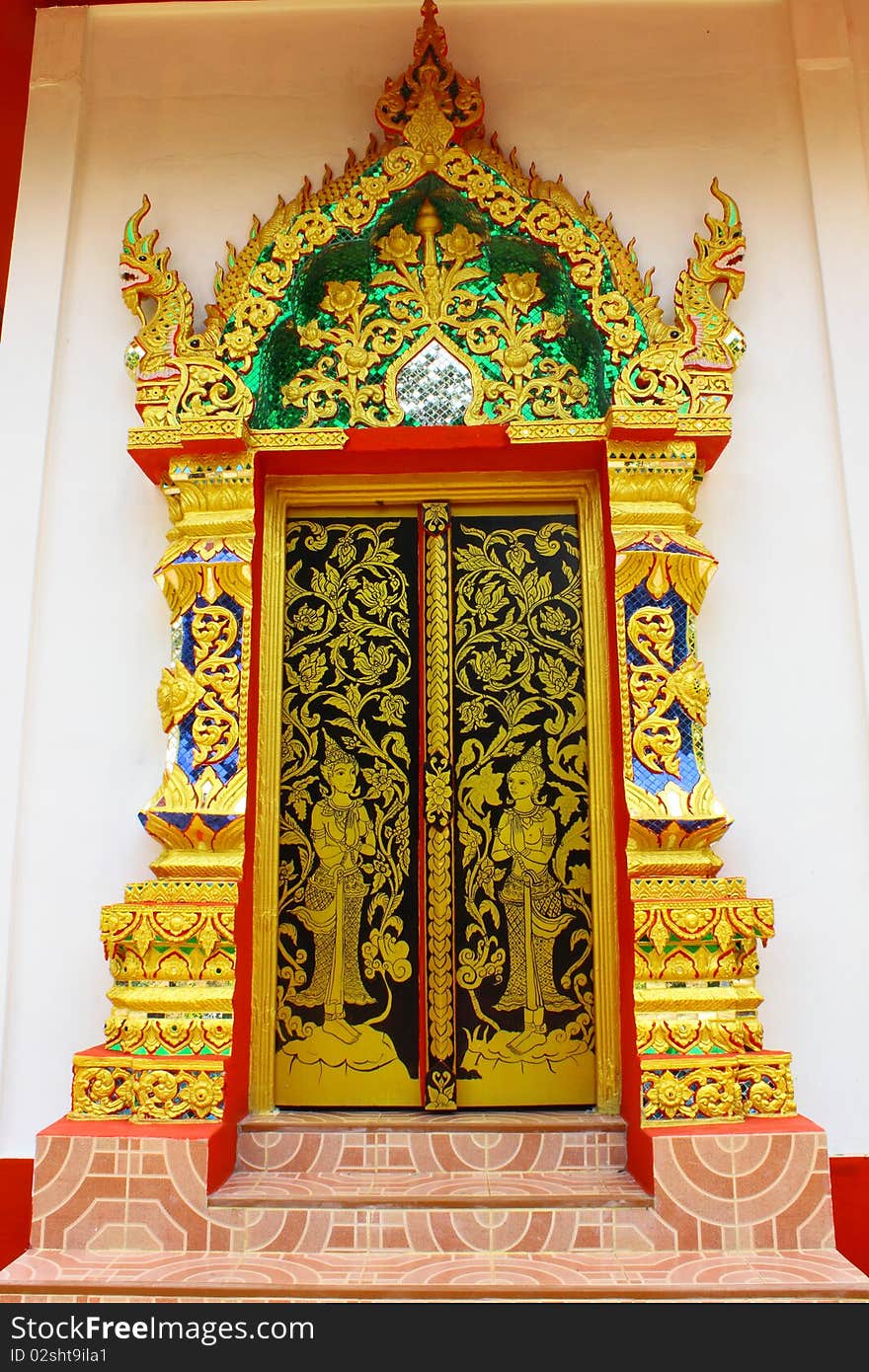 Painting on door in temple,Wat Boe Kaew,Phrae,Thailand. Painting on door in temple,Wat Boe Kaew,Phrae,Thailand.