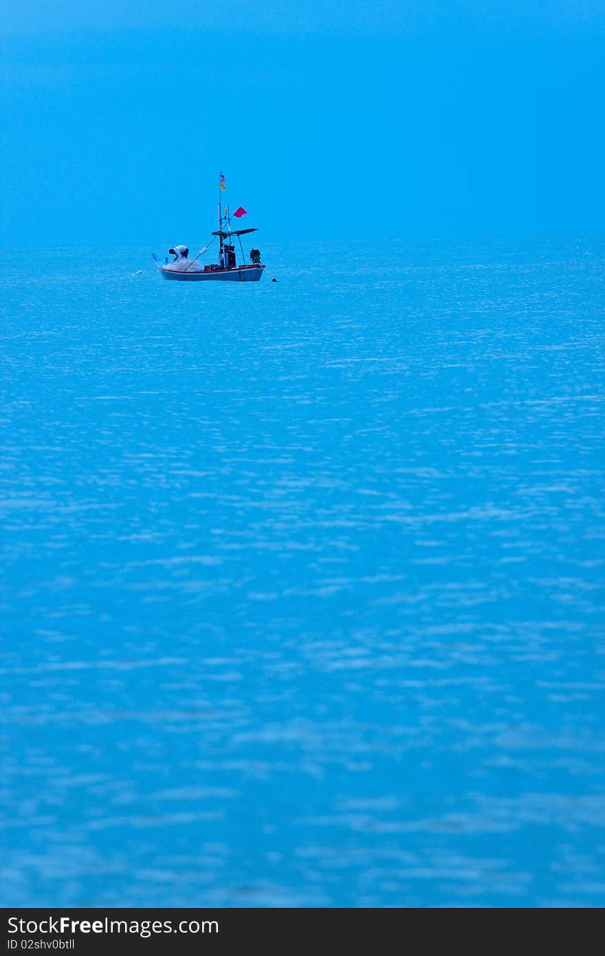 Thai fisherman net to catch fish in the early morning. Thai fisherman net to catch fish in the early morning.