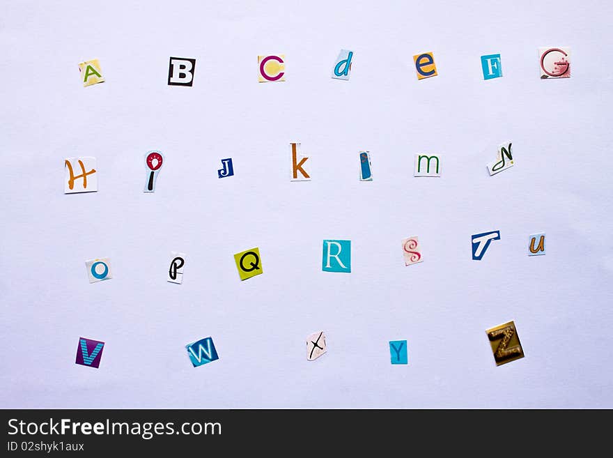 Alphabet made of newspaper clippings - colorful ABC.