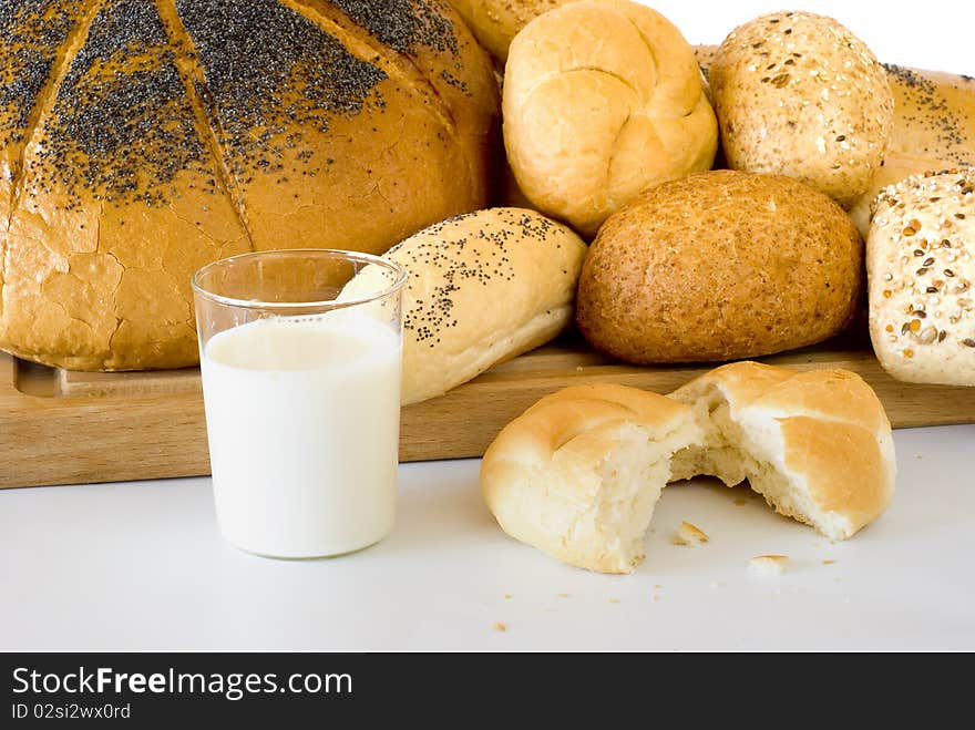 Fresh bread on the board with the sour cherry of the milk. Fresh bread on the board with the sour cherry of the milk