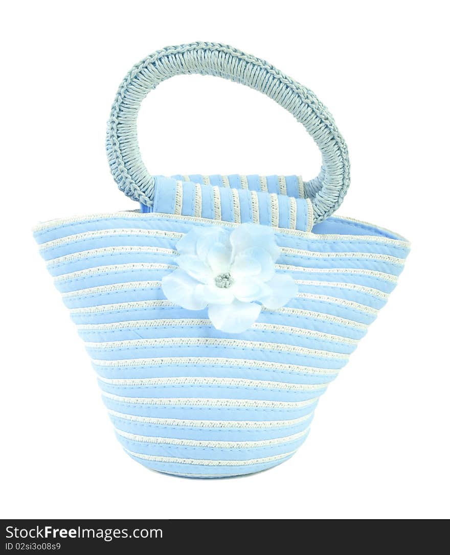 Blue textile bag with flower. Isoalted on white background. Blue textile bag with flower. Isoalted on white background