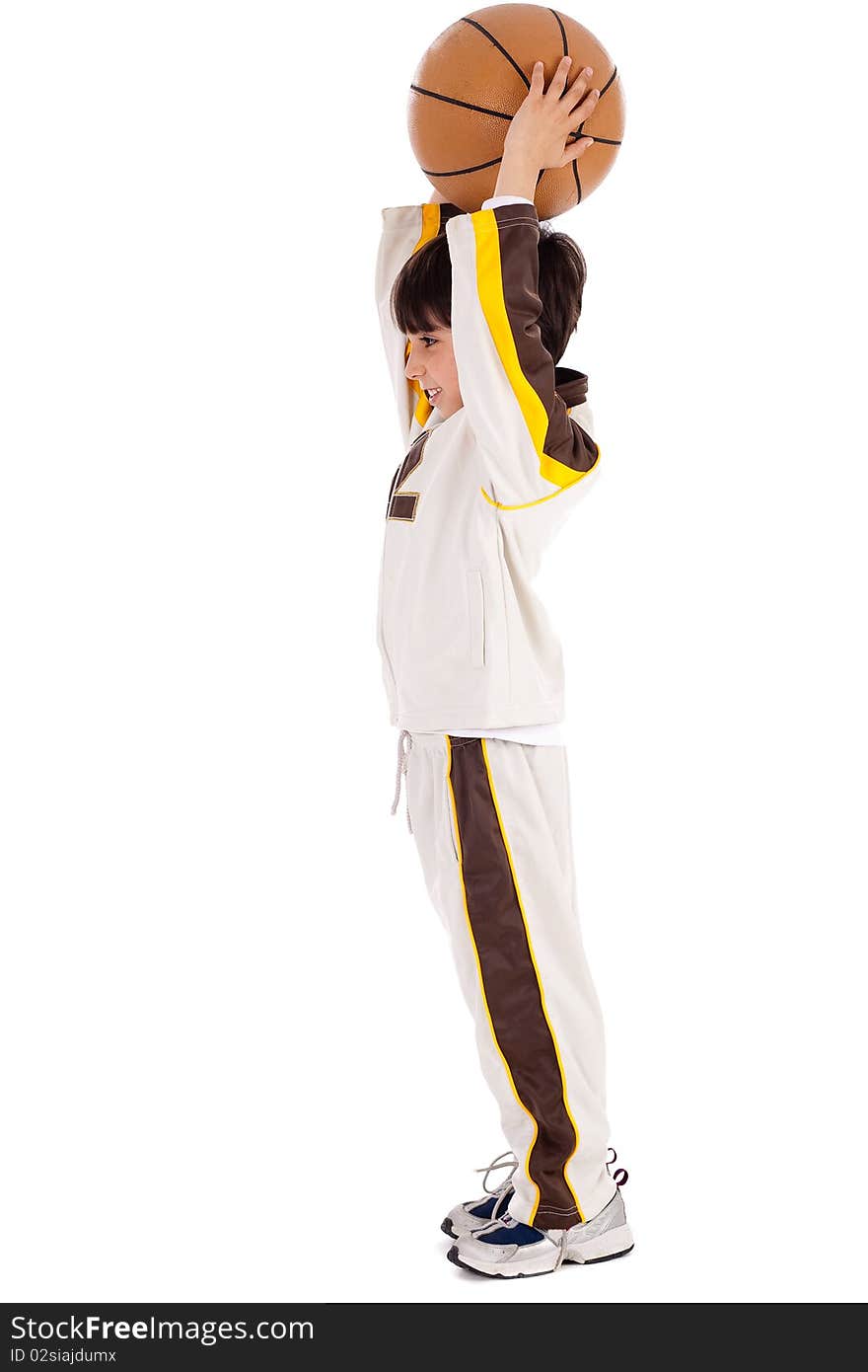 Portrait of young caucasian boy playing basket ball over white background