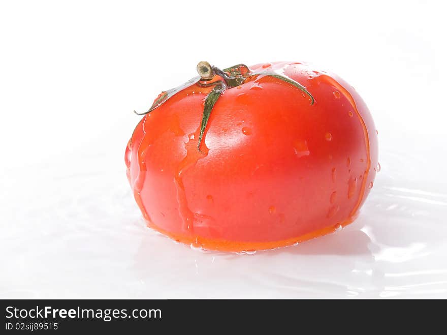 Fresh tomatoe in water