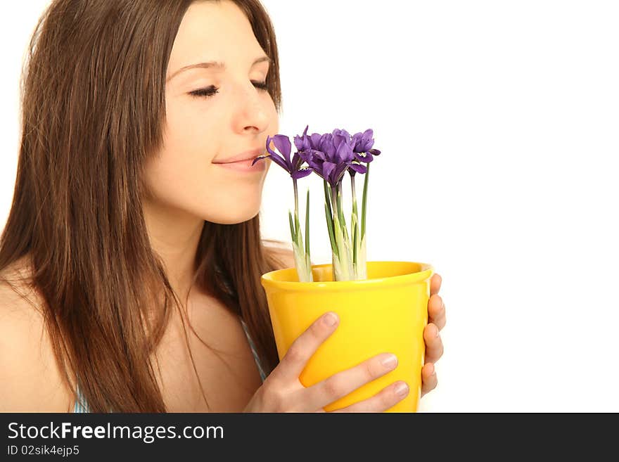 Young brunette woman with flowerpot