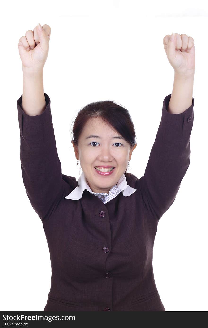 An Asian businesswoman with her arms raised. An Asian businesswoman with her arms raised