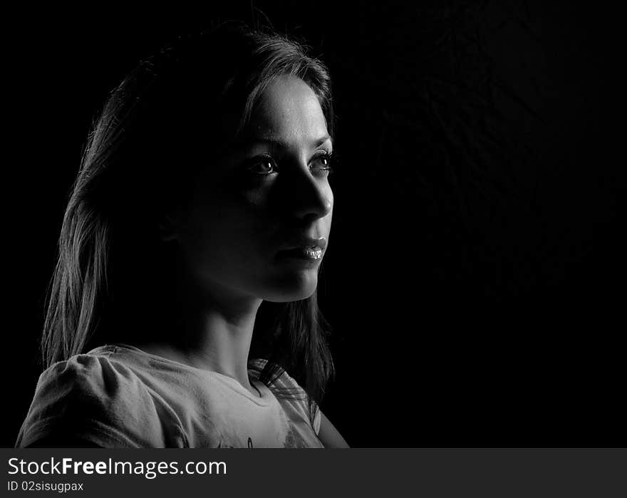 Girl posing on a black background. Girl posing on a black background