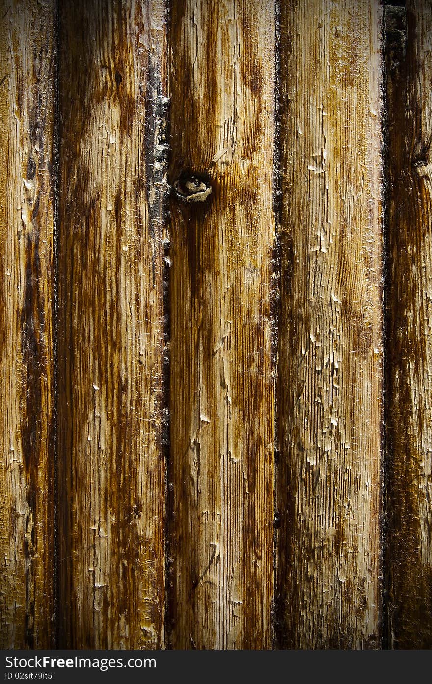 A brown plane of old rough wood. A brown plane of old rough wood