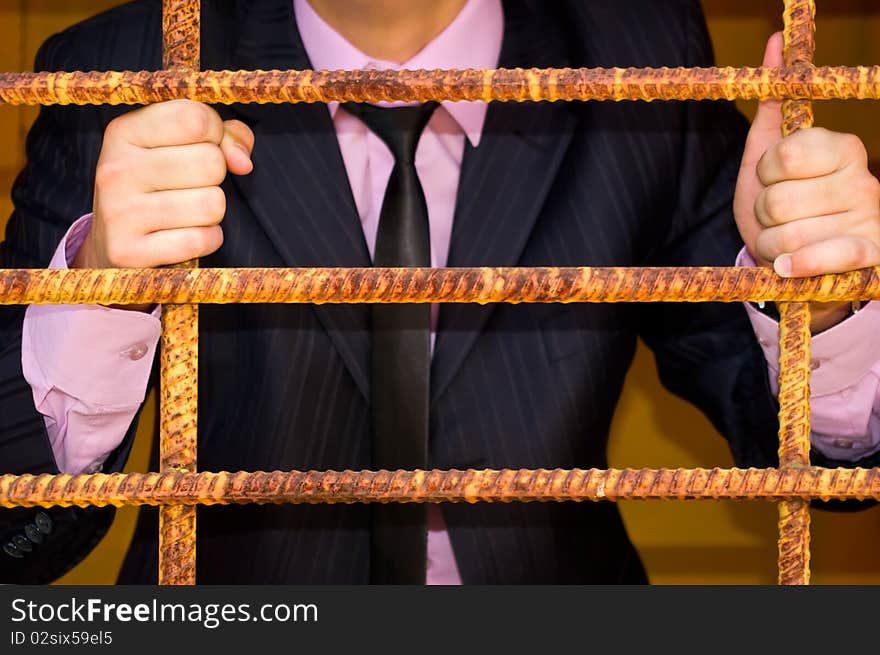 Man Close - Up Portrait. Behind An Iron Lattice. Man Close - Up Portrait. Behind An Iron Lattice