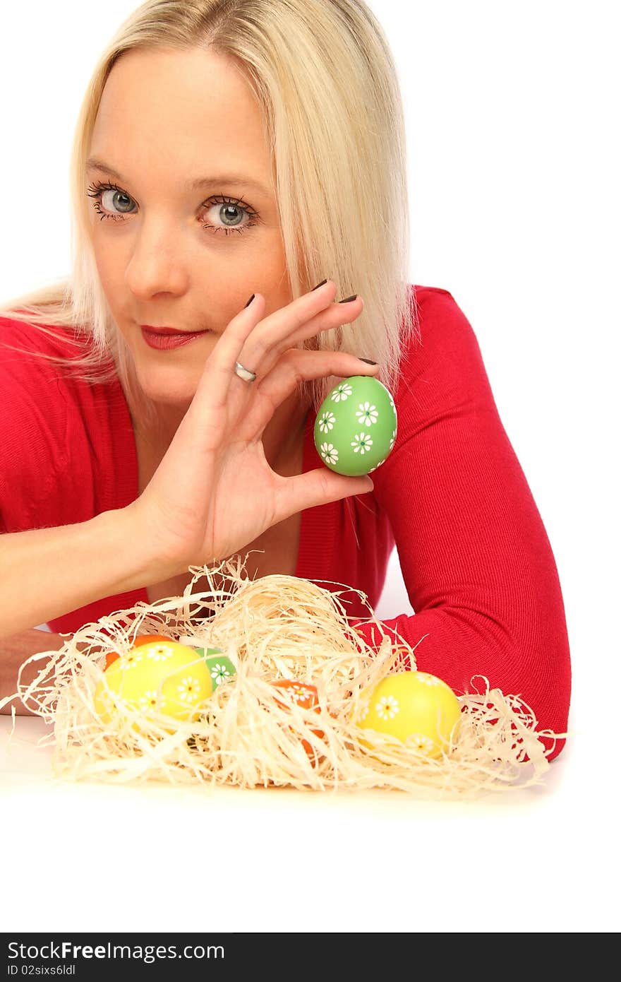 Beautiful blond woman laying on the floor with some easter eggs. Beautiful blond woman laying on the floor with some easter eggs