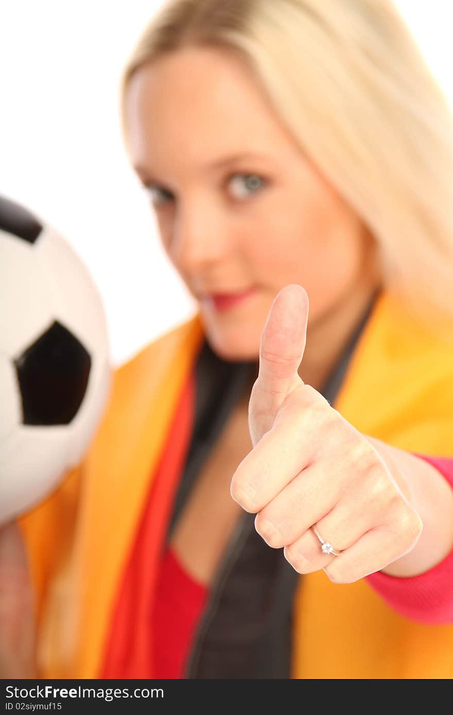 Blond woman with Thumbs high and a football