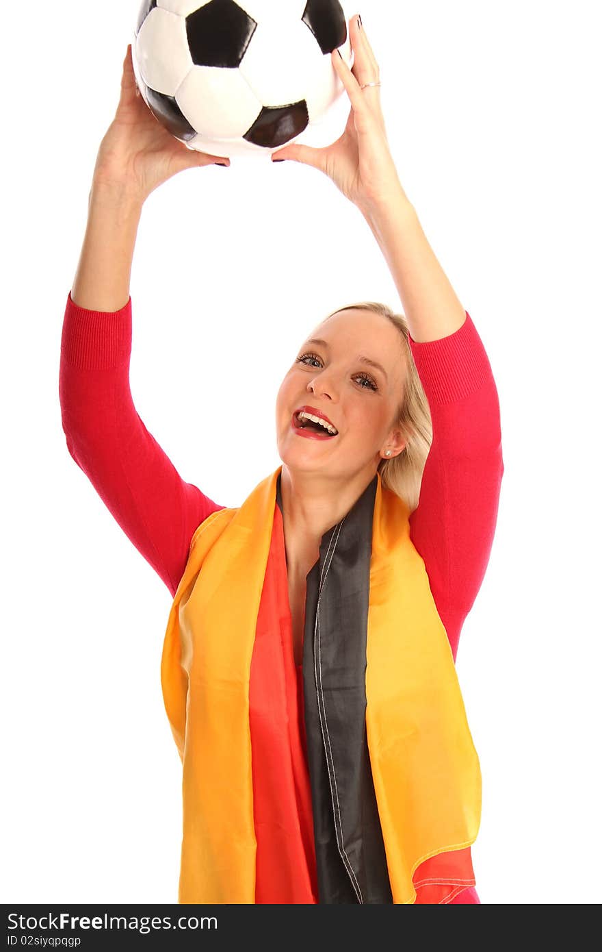 Blond female football fan with a german flag and a football