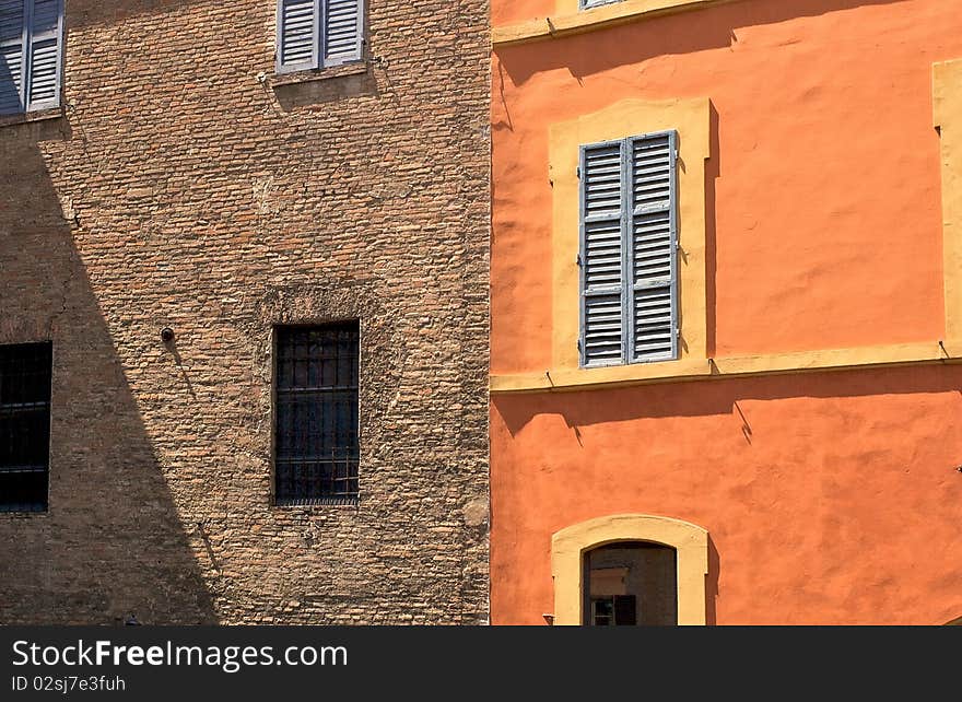 Colorful facades of Italian houses with windows. Colorful facades of Italian houses with windows