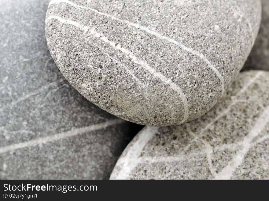 Background with round peeble stones in studio