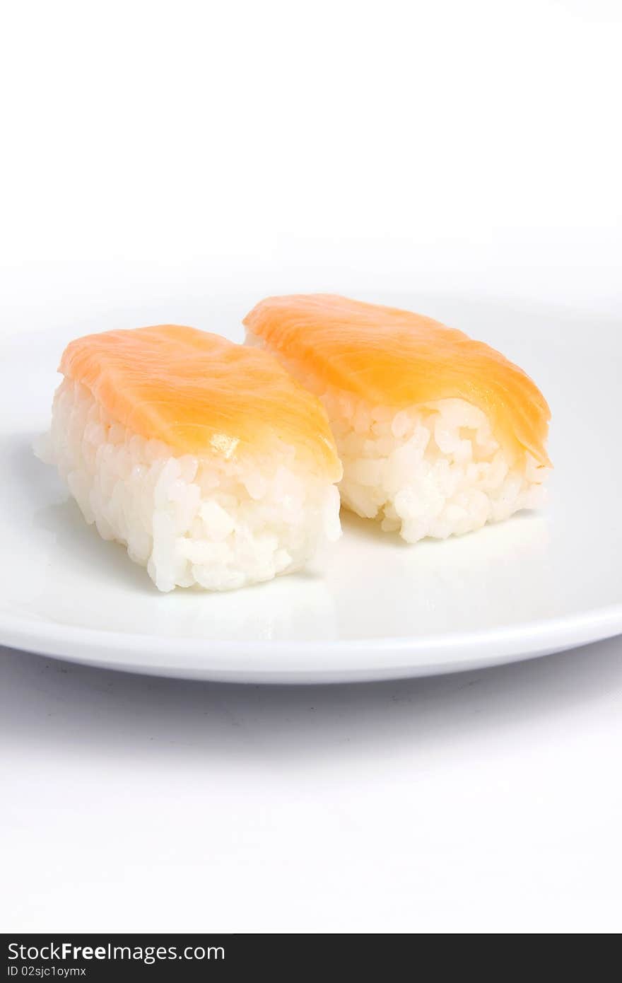 Japanese sushi with salmon fish on white background