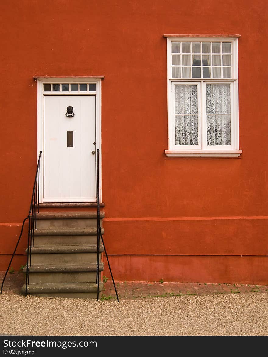 Graphical image of a facade with door and window with a Mediterranean touch. Graphical image of a facade with door and window with a Mediterranean touch