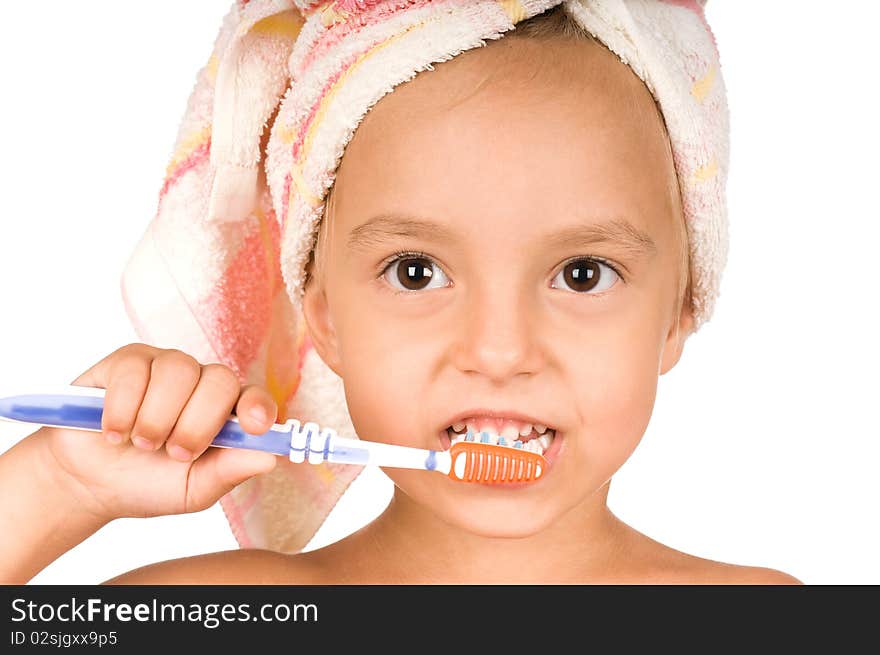 Happy little girl with toothbrush. Isolated on white background.