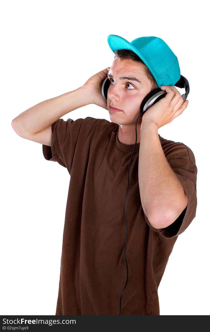 Young fresh teenager with headphones isolated over a white background. Young fresh teenager with headphones isolated over a white background.