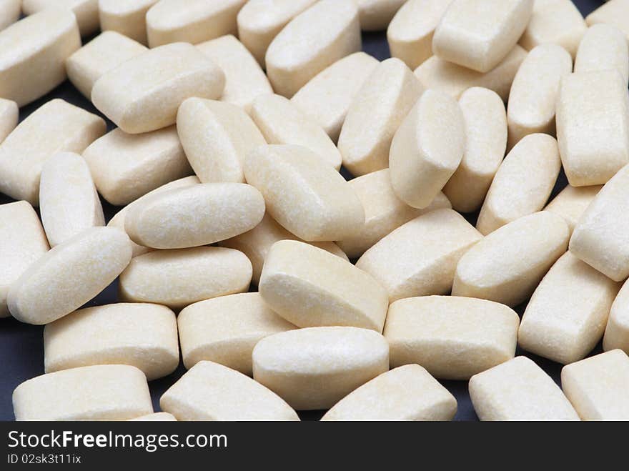 Pills on a black background