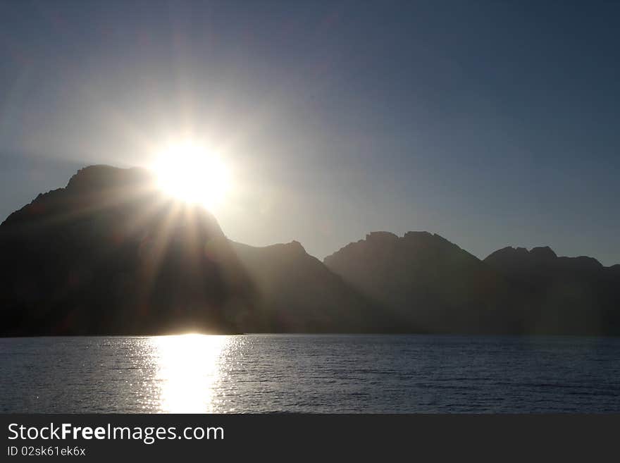 The sun setting over Mount Moran in the Tetons. The sun setting over Mount Moran in the Tetons