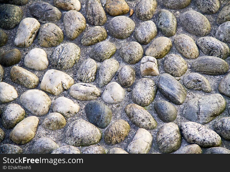 Background of small pebbles of a road. Background of small pebbles of a road