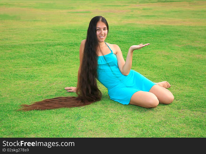 Portrait of a beautiful woman with long hair