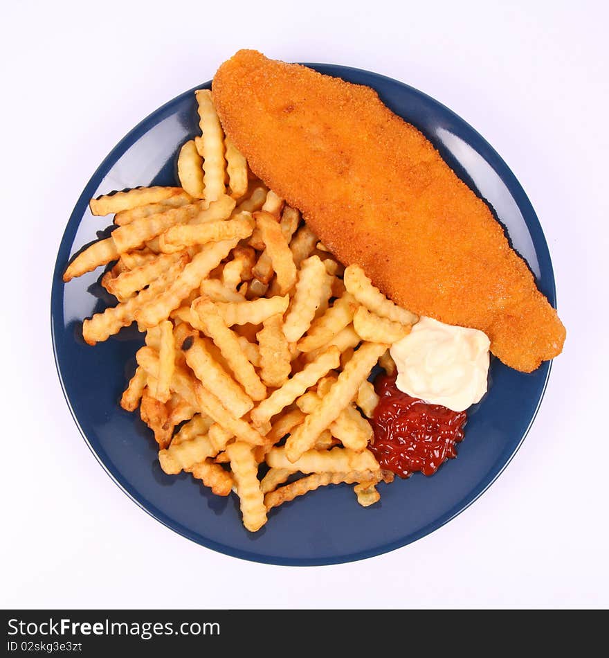 British cuisine: Fish and chips with ketchup and mayonnaise