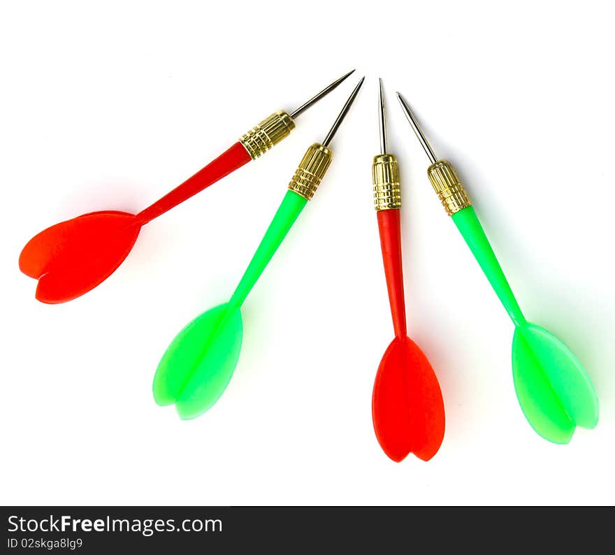 Red and green darts isolated on white background