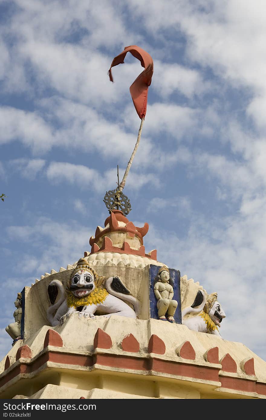 Top on an Hindu Temple with a red flag in Puri, Orissa, India. Top on an Hindu Temple with a red flag in Puri, Orissa, India.