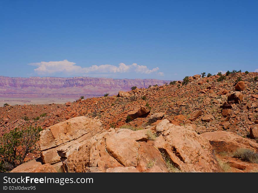 A mesa in the distance across the desert.