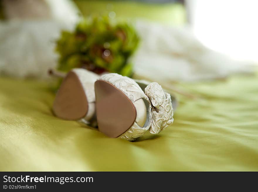 Wedding bouquet and shoes