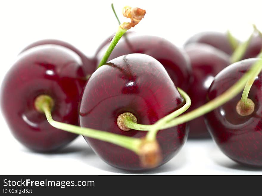 Cherries closeup isolated on white