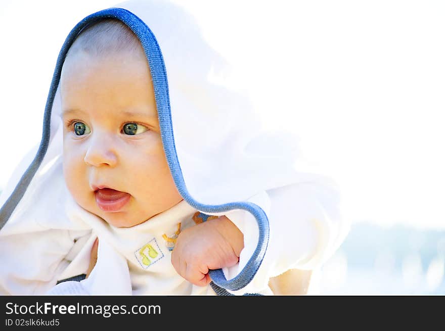 Portrait of the child in a blanket. Portrait of the child in a blanket