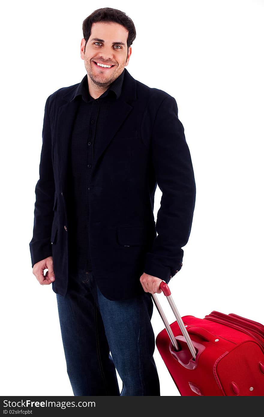 Young man standing with travel bag on an isolated background. Young man standing with travel bag on an isolated background