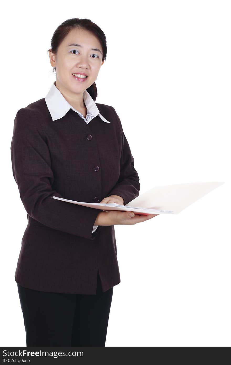 An Asian businesswoman holding a folder. An Asian businesswoman holding a folder