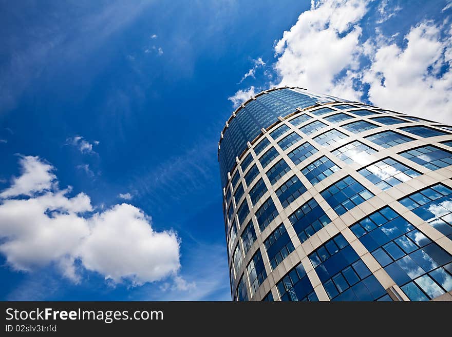 Skyscraper in business centre on a sky background. Skyscraper in business centre on a sky background