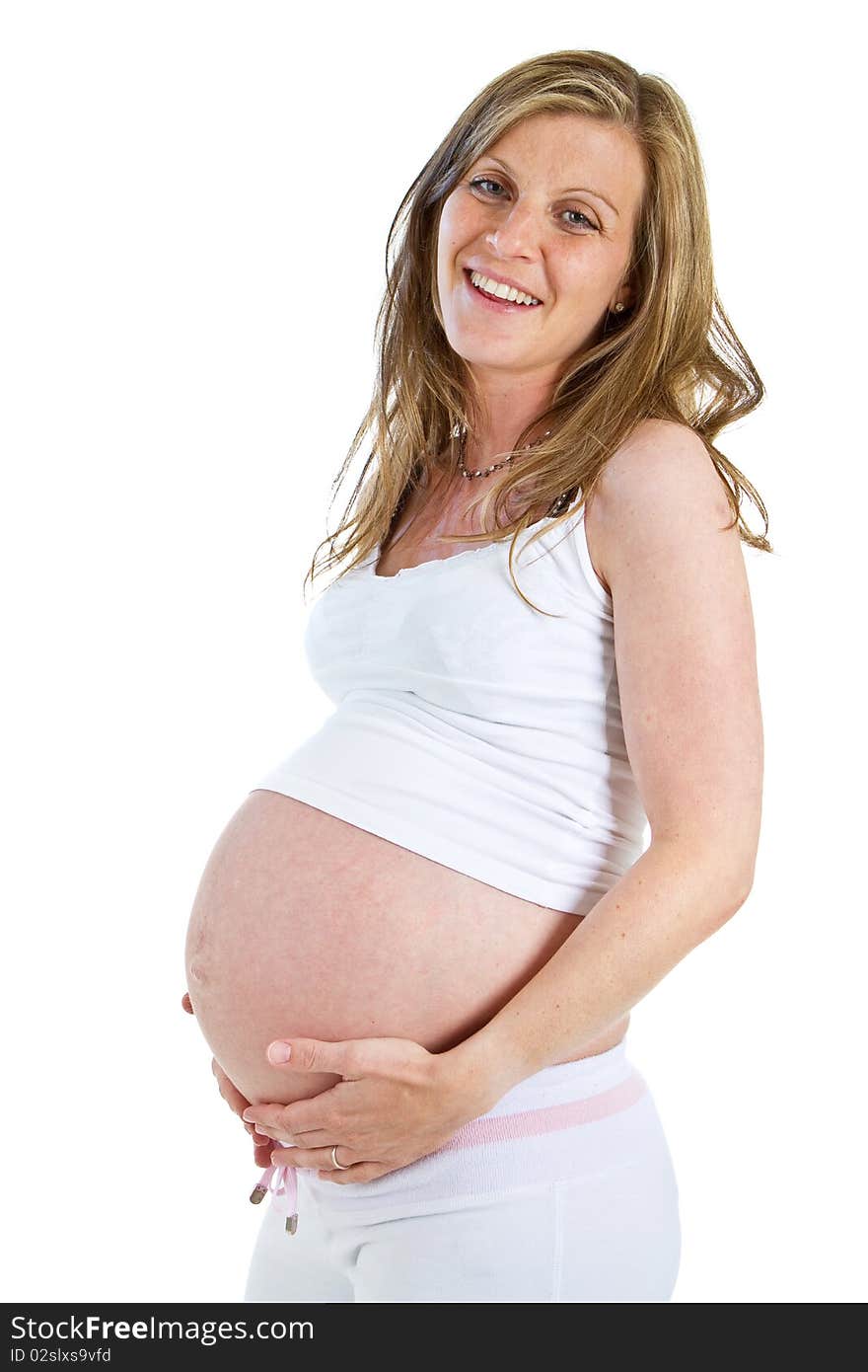 Young fresh pregnant woman isolated over white background. Young fresh pregnant woman isolated over white background.