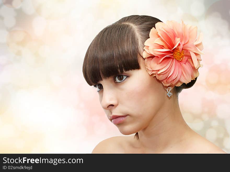 Front view of young beautiful woman's face with healthy fresh clean skin